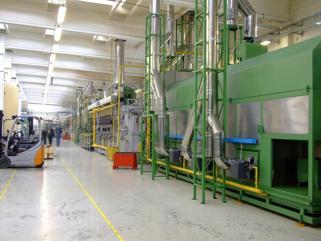 Factory production hall with machines, where a manufacturing marketing strategy has to start