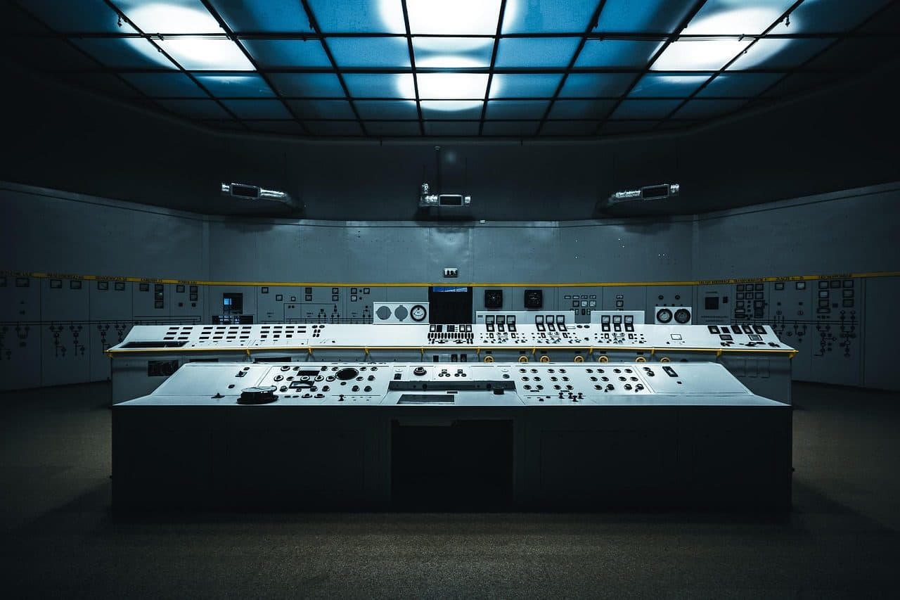 Industrial control room with a long control desk, a reminder that marketing results need tracking too