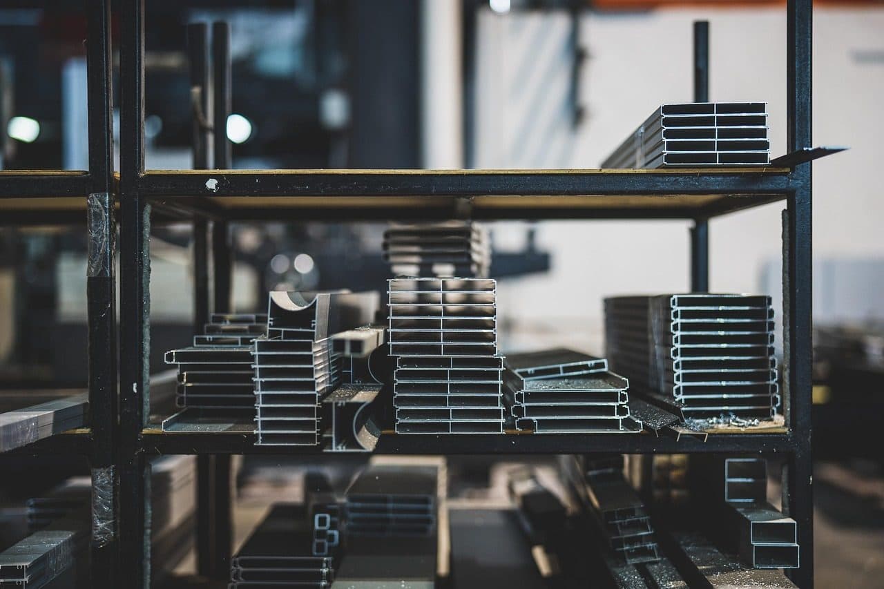Steel profiles stored on warehouse racks, stock that a steady flow of enquiries keeps moving